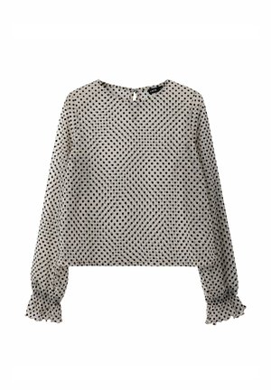 Blusa beige a maniche lunghe con pois neri, scollo rotondo, chiusura a bottone sul retro con apertura a goccia e polsini elastici arricciati.