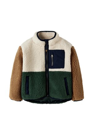 Veste en polaire avec partie supérieure crème, bas vert, manches marron, poche poitrine zippée bleu marine et fermeture éclair frontale.