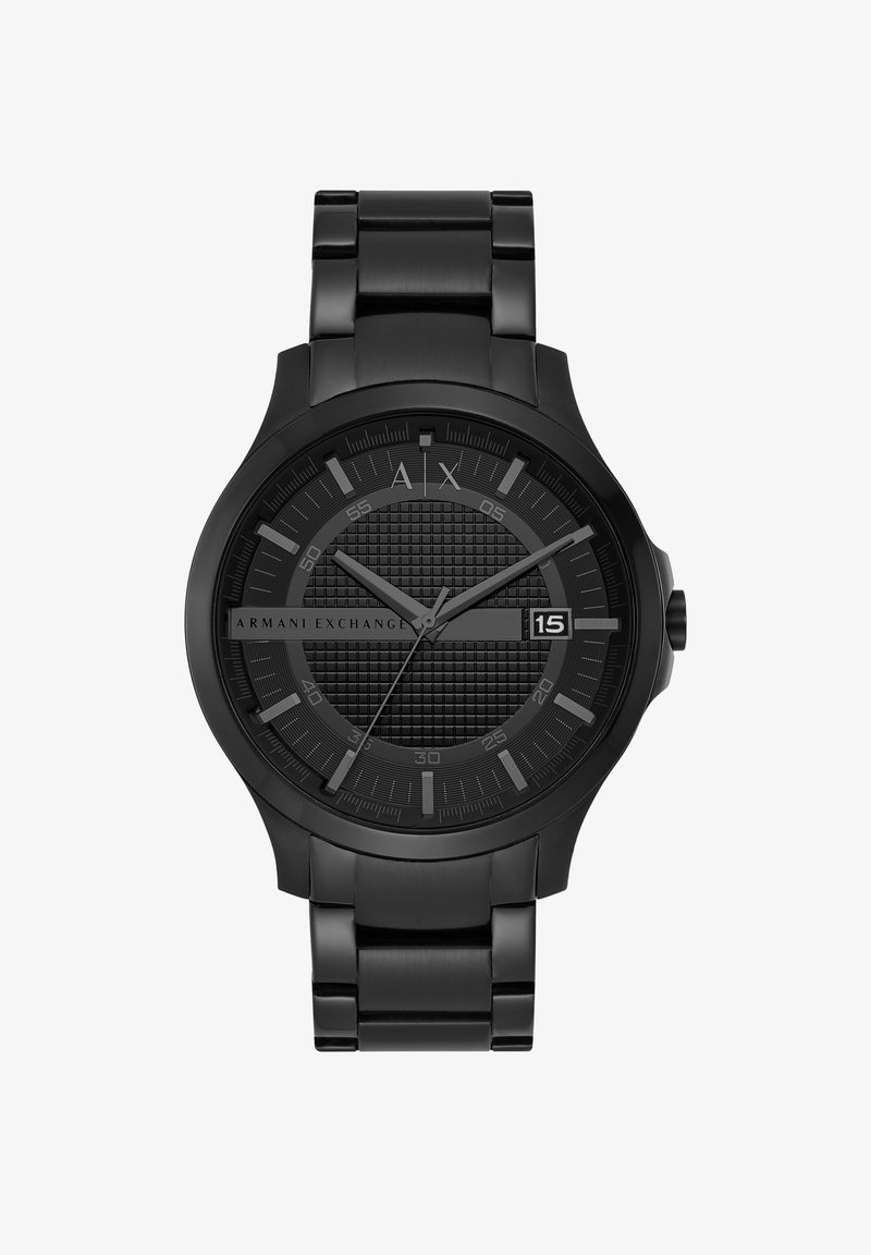 Mustmust terasest kell, millel on tekstuuriga kellapesa, julged tunnimarkerid ja kuupäeva näitamine. Omab vastupidavat metallrandme ja minimalistlikku disaini.