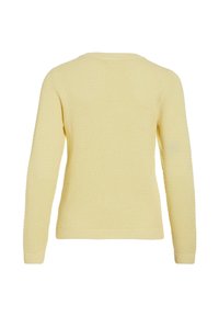 Ανοιχτό κίτρινο πλεκτό πουλόβερ με υφή μοτίβου, μακριά μανίκια και στρογγυλή λαιμόκοψη. Ριμπ τελειώματα στα μανίκια και στη βάση. Εμφανίζεται η οπίσθια όψη.