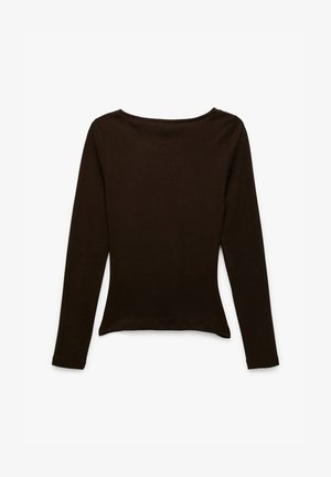Long-sleeve brown top with a round neckline, fitted design, soft texture, and curved hem. No visible prints or embellishments.