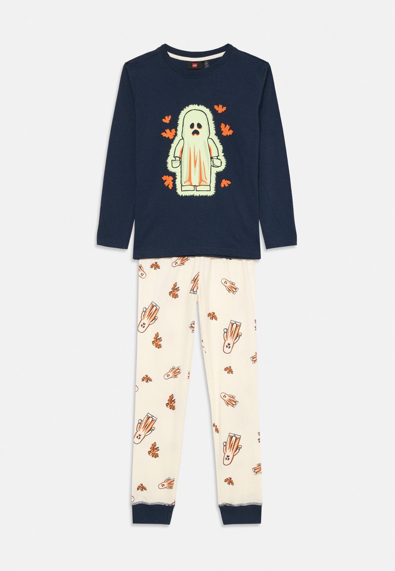 Detské pyžamo na dva kusy, ktoré obsahuje tmavomodrú dlhú blúzku s grafikou monštra a krémové nohavice s oranžovými vzormi duchov a listov.