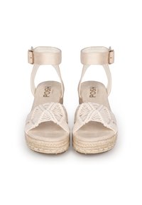 Sandalias de esparto beige con parte superior de tejido trenzado y correa al tobillo. Presenta una plataforma alta de yute texturizado y un forro interior suave.