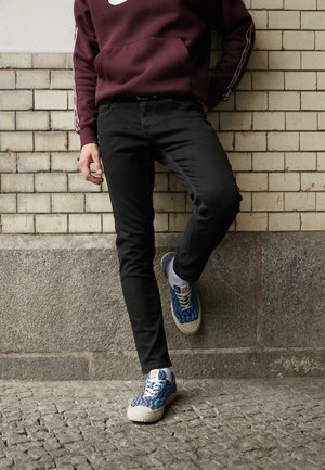 Tommy Jeans Vaqueros tapered - black denim
