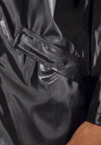 Rains LONG JACKET UNISEX - Parca - shinny black