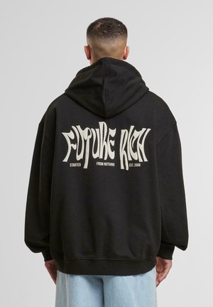 Black hoodie with a loose fit, featuring large white text on the back that reads "FUTURE RICH" and additional details below.