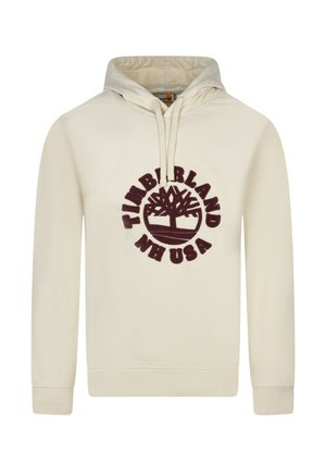 Kremowa bluza z kapturem, z troczkami, z przednią kieszenią kangurką oraz dużym bordowym logo Timberland umieszczonym na środku klatki piersiowej. Materiał z mieszanki bawełny.