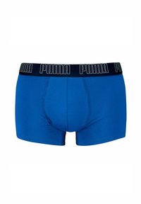 Boxer in cotone blu con cintura scura e logo "PUMA" bianco. Texture liscia con design aderente.