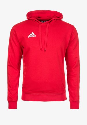 Sweat à capuche rouge Adidas avec cordons à l'avant et logo Adidas blanc sur la partie supérieure gauche de la poitrine, avec poignets et ceinture côtelés.