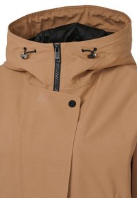 Tan waterproof jacket with a high collar, front zipper, and adjustable drawstring. Features a matte finish and a single black snap button.
