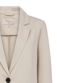 Beige blazer met een reverskraag, enkele zwarte knoopsluiting en een gladde textuur. Binnenzijde toont stikseldetails en label.