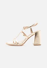 Επιλέχθηκε, gold-coloured