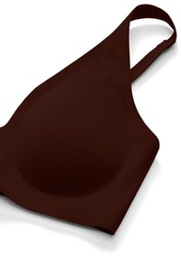 Soutien-gorge marron foncé sans coutures avec bonnets moulés et une bretelle réglable sur fond blanc.