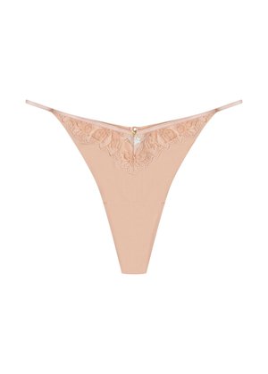Nude lace thong featuring intricate floral lace trim, a small gold accent at the center, and thin adjustable straps. Soft texture and minimal coverage.