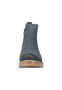 Bottines noires à cheville avec un dessus lisse, un bout rond et une semelle en caoutchouc texturée. Équipées d'une fermeture éclair sur le côté pour un enfilage facile.