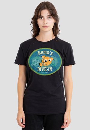Black cotton t-shirt featuring a colorful graphic of a cartoon fish with text “Nemo’s DIVE-IN” and a circular green and blue background.