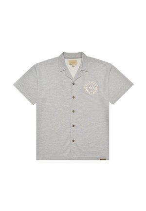 Camicia a maniche corte grigio chiaro con colletto e stemma "911 Pas de Monaco" sul petto a sinistra.