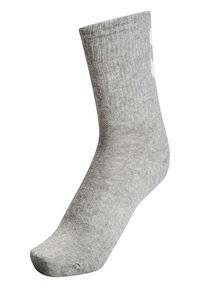 Calcetín de algodón gris con textura acanalada, de altura media y diseño de punta sin costuras. Cuenta con un pequeño logo blanco en el lateral.