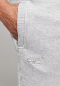 Superdry & Co Spodnie treningowe
