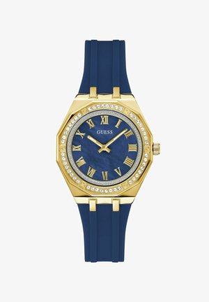 Gouden octagonale horloge met een blauwe wijzerplaat, Romeinse cijfers en kristallen accenten, voorzien van een blauwe siliconen band.