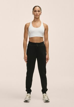 ARIA JOGGERS - Pantalones deportivos - black