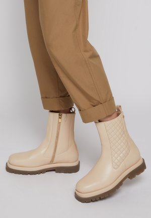 Enkellaarsjes met plateauzool - beige