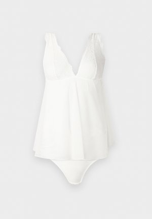 Body lingerie blanc sans manches avec bonnets en dentelle et jupe fluide en mesh, décolleté plongeant en V et bas échancré.