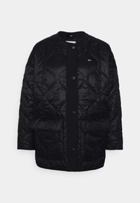 Black quilted jacket featuring a rounded neckline, snap buttons, two front pockets, and a smooth, shiny texture.