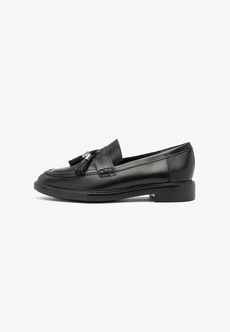 Black leather loafers with a rounded toe, tassel accent, and a low block heel. Features stitching detail along the upper.
