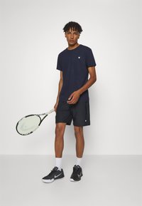 Björn Borg ACE SHORTS - Sportiniai šortai - black beauty