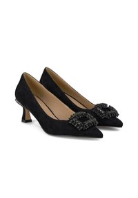 Black suede low-heeled pumps with pointed toes and embellished buckle accents on the fronts. Smooth interior lining. Classic design.