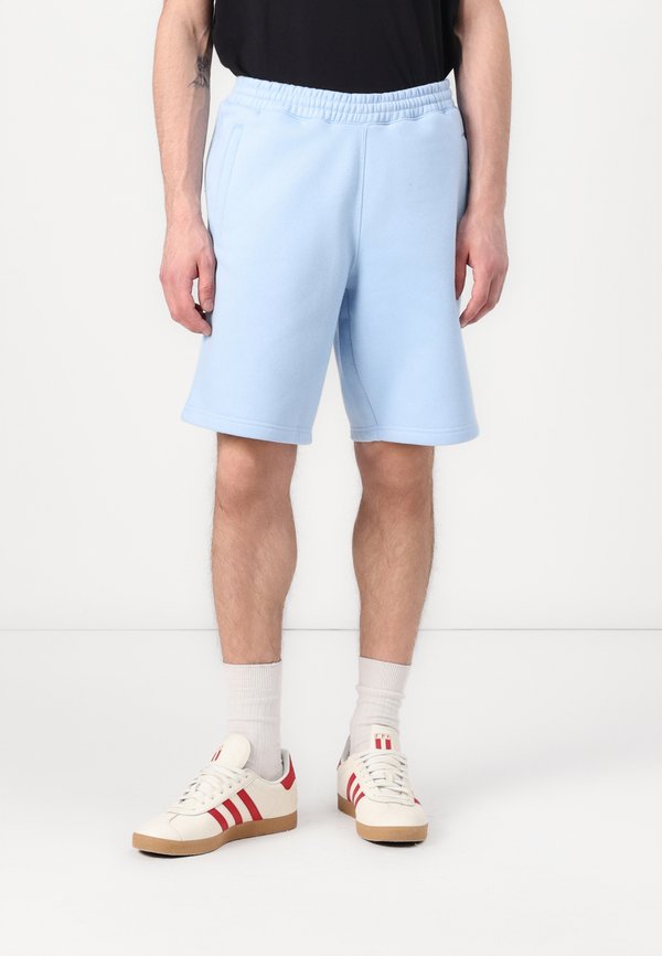 ESSENTIAL - Tracksuit bottoms - clear sky