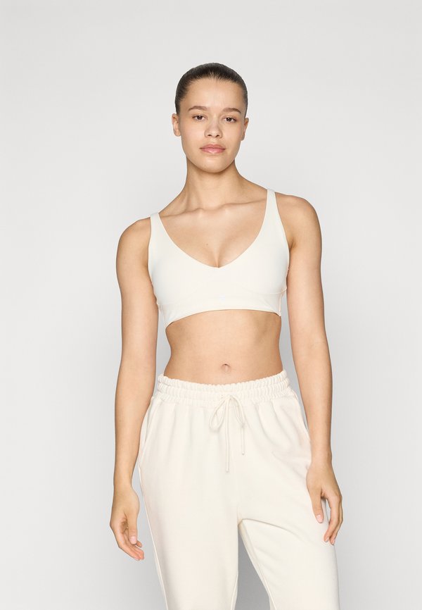 PURELUXE LONGLINE LOW IMPACT BRA - Light support sports bra - bone