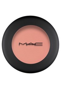 Ronde blush compact met een matte zwarte buitenkant. Binnenin een zachte, perzikkleurige poedertextuur. MAC-logo in het zwart in het midden.
