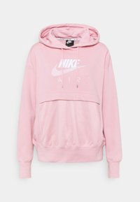 Rosa Nike Air hoodie med en framficka i mesh, dragsko i huvan och vitt logotyp. Har långa ärmar samt ribbade mudd och fåll.