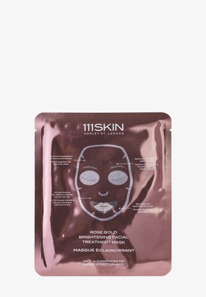 Rose guld ansigtsmaske pakke med ansigtsdiagram og tekst, der beskriver oplysende, anti-rynke, hudbarriere og nærende fordele.
