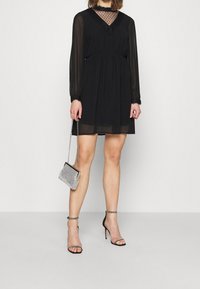 Vero Moda Koktejlové šaty / šaty na párty - black