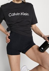 Calvin Klein Performance Camiseta estampada - black