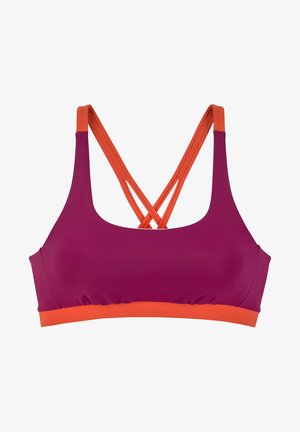 Fioletowy stanik sportowy z krzyżowym pleczeniem. Posiada szerokie pomarańczowe ramiączka i marszczony dół, co zapewnia pewne dopasowanie. Gładka tekstura, elastyczny materiał.