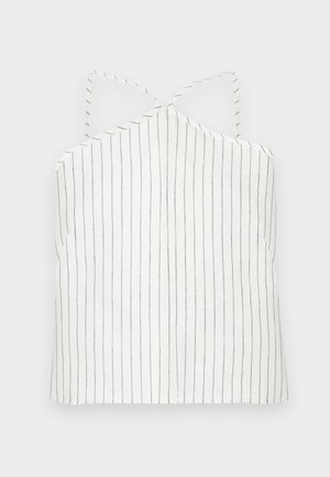 Bela majica brez rokavov z ozkimi črnimi navpičnimi črtami. Ima halterski ovratnik z križnimi naramnicami in ravnim robom. Lahka, gladka tekstura.