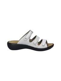 Silver slide sandal with three adjustable straps, black sole, and cushioned footbed, featuring a smooth leather upper and minimal hardware.