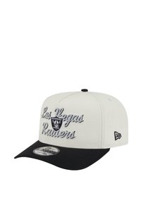 White baseball cap with a black visor, featuring embroidered "Las Vegas Raiders" text and logo in gray. Structured design and flat brim.