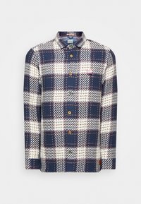Camicia a quadri con bottoni, caratterizzata da colori blu navy, bianco e rosso, realizzata in un tessuto testurizzato, con bottoni in legno e un logo a patch sul petto.