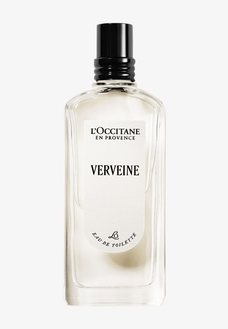 Flacon de parfum en verre transparent avec bouchon noir étiqueté L'Occitane en Provence Verveine Eau de Toilette.