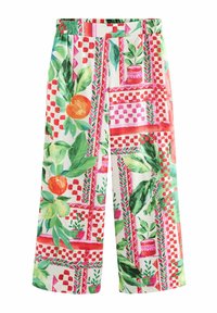 I pantaloni larghi in cotone presentano una base bianca con grandi stampe floreali colorate, motivi geometrici in rosso e rosa, e una vita elastica.
