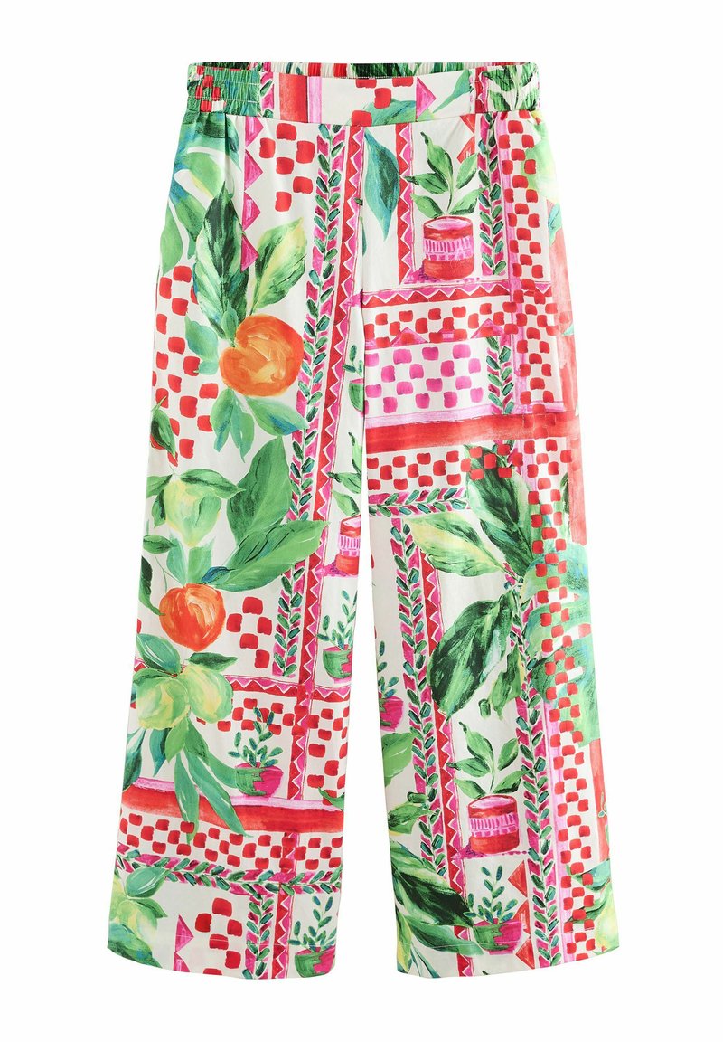 I pantaloni larghi in cotone presentano una base bianca con grandi stampe floreali colorate, motivi geometrici in rosso e rosa, e una vita elastica.