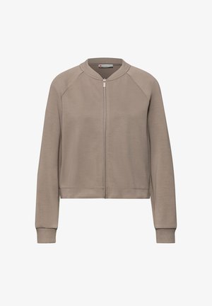 Chaqueta bomber beige con cremallera, cuello, puños y dobladillo acanalados, que presenta mangas raglán largas y una textura de tela suave.