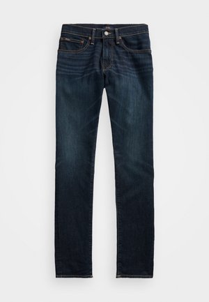 Dunkelblaue Slim-Fit-Jeans mit fünf Taschen, Knopfverschluss und sichtbaren Verblassungen im vorderen Oberschenkelbereich.
