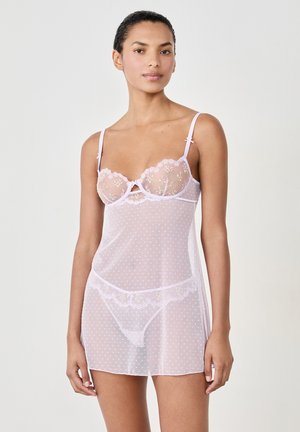 Lace-trimmed, sheer pink nightgown with white polka dots; features adjustable straps and floral embroidery on the cups. Includes matching panties.