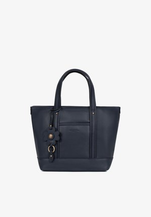 Navyblauwe leren shopper met dubbele handvatten, een voorvak en een decoratieve bloemvormige hanger met goudkleurige accenten.